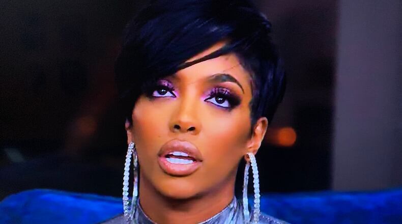 Porsha Williams listening to Drew Sidora rant about LaToya and Prophet Anthony Lott Jr. during the season 13 finale of "Real Housewives of Atlanta" that aired Sunday, April 18, 2021. BRAVO
