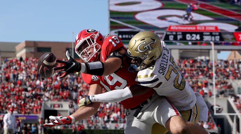 Georgia tight end Brock Bowers is unable to catch a pass against Georgia Tech defensive back Rodney Shelley during the first quarter Saturday at Sanford Stadium. (Jason Getz/Atlanta Journal-Constitution/TNS)