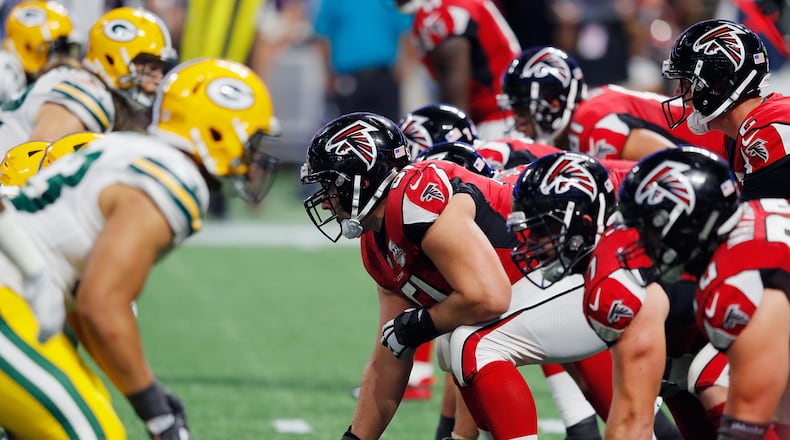 Falcons center  Alex Mack #51 prepares to snap the ball during the second half against the Packers at Mercedes-Benz Stadium on September 17,  in Atlanta