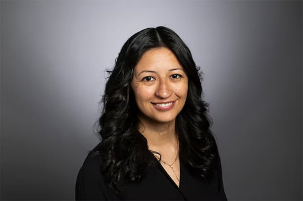 Dr. Roxana Chicas, an assistant professor of nursing at Emory University in Atlanta, worked with a team of researchers from Georgia Tech to develop a device to help outdoor workers monitor how heat is affecting their bodies. (Courtesy of Dr. Roxana Chicas)