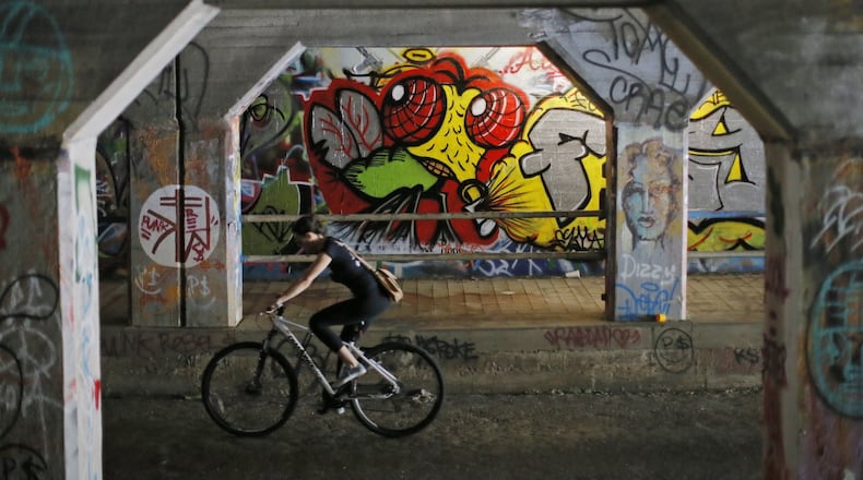 The vibrant walls of the Krog Street Tunnel are ever-changing with various artists making contributions. BOB ANDRES /BANDRES@AJC.COM