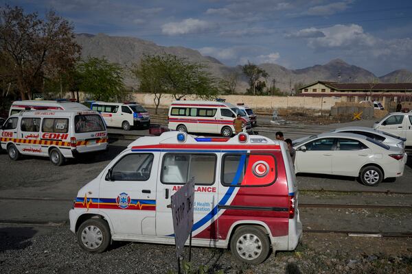 Ambulances park outside a railway station where rescued and injured passenger of a train attacked by insurgents are brought in Much, Pakistan's southwestern Balochistan province, Wednesday, March 12, 2025. (AP Photo/Anjum Naveed)