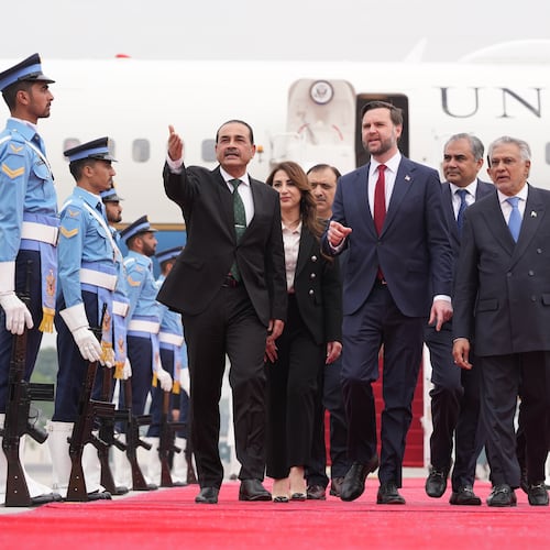 U.S. Vice President JD Vance, center, walks with Pakistan's Chief of Defence Forces and Chief of Army Staff Field Marshall Asim Munir, left, and Pakistani Deputy Prime Minister and Foreign Minister Mohammad Ishaq Dar after arriving for talks with Iranian officials in Islamabad, Pakistan, Saturday, April 11, 2026. (AP Photo/Jacquelyn Martin, Pool)