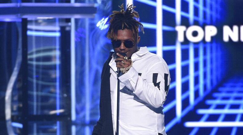 Rapper Juice Wrld died after suffering a seizure at Chicago's Midway Airport on Dec. 8. He was 21.