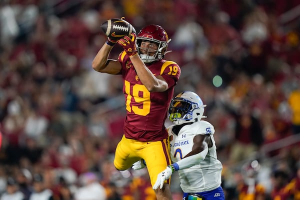 FILE - Southern California wide receiver Duce Robinson (19) catches a pass against San Jose State defensive back DJ Harvey (2) during the second half of an NCAA college football game Saturday, Aug. 26, 2023, in Los Angeles. (AP Photo/Ryan Sun, File)