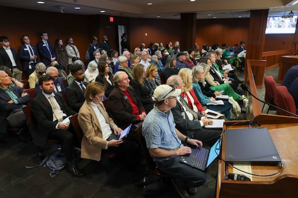 A crowd attended the meeting on Tuesday and saw the committee advance a bill that would push back the deadline to stop counting votes with QR codes to 2028. (Arvin Temkar/AJC)