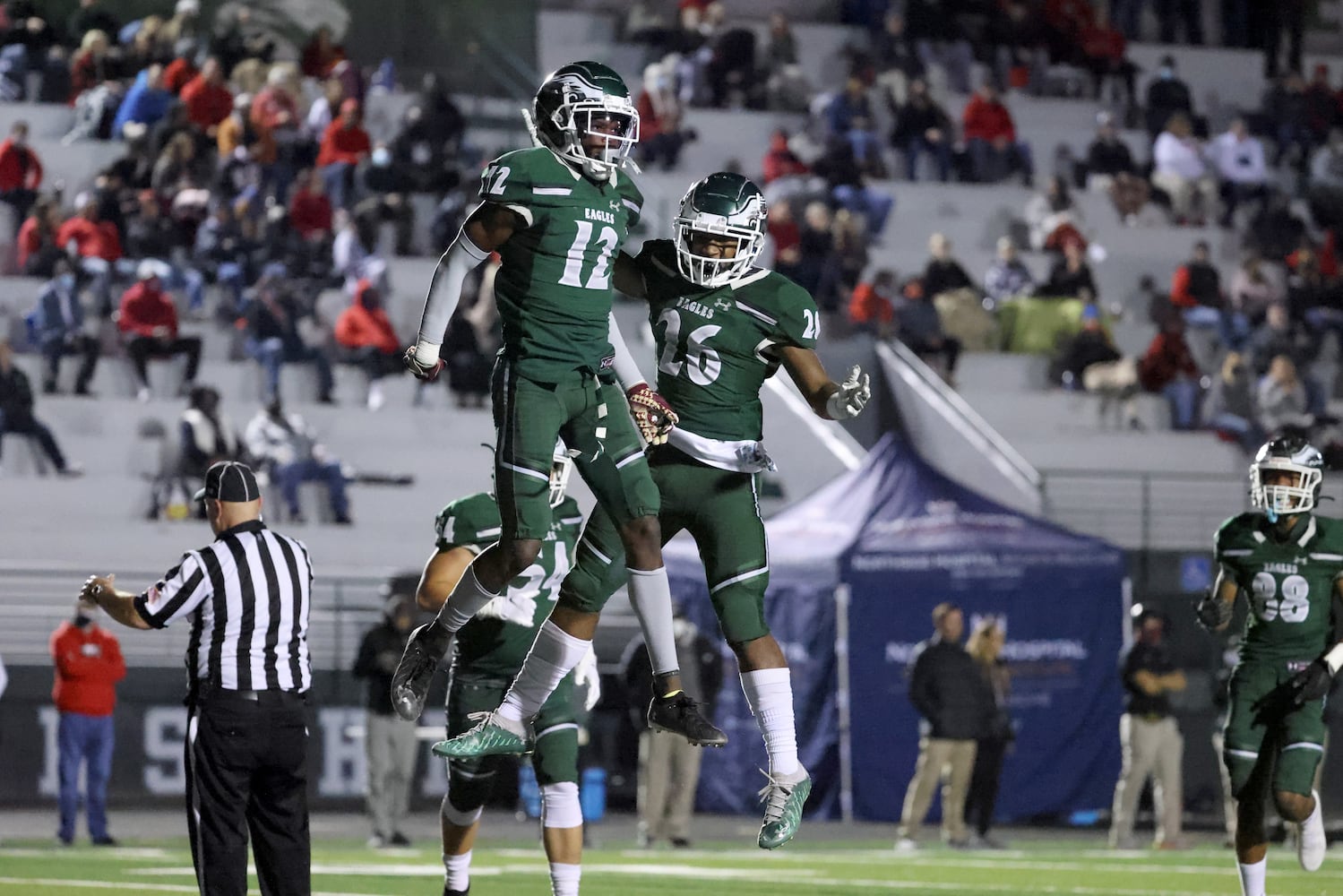 Collins Hill wide receiver Travis Hunter (12) celebrates his touchdown with running back Spenser Anderson (26). JASON GETZ FOR THE ATLANTA JOURNAL-CONSTITUTION