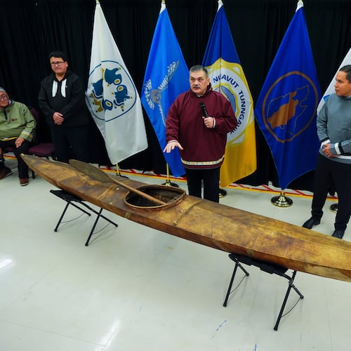 Paul Irngaut, Acting President of Nunavut Tunngavik Inc., left to right, Duane Smith, Chair and CEO of the Inuvialuit Regional Corp., Darrel Nasogaluak, Elder and Chair of Tuktoyaktuk Community Corp., and Natan Obed, President of Inuit Tapiriit Kanatami answer questions after the unveiling of a traditionally built Inuvialuit kayak and a selection of Inuit items at the Canadian Museum of History in Gatineau, Que., on Tuesday, Dec. 9, 2025. (Sean Kilpatrick /The Canadian Press via AP)