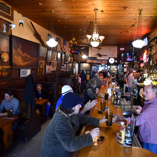 A packed crowd of lunch goers at Manuel's Tavern on Friday, February 27, 2015. (Hyosub Shin/AJC 2015)