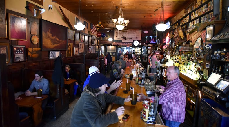 A packed crowd of lunch goers at Manuel's Tavern on Friday, February 27, 2015. (Hyosub Shin/AJC 2015)