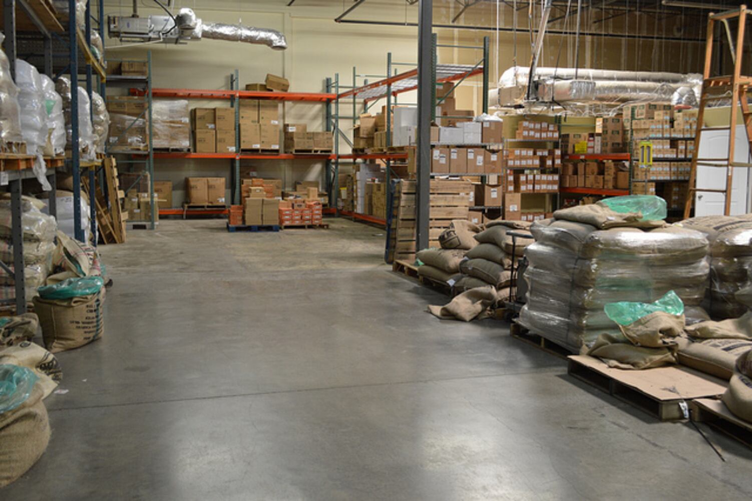 The warehouse acts as a storage facility, a roasting facility, a production and mailing facility, and an office for Batdorf & Bronson.