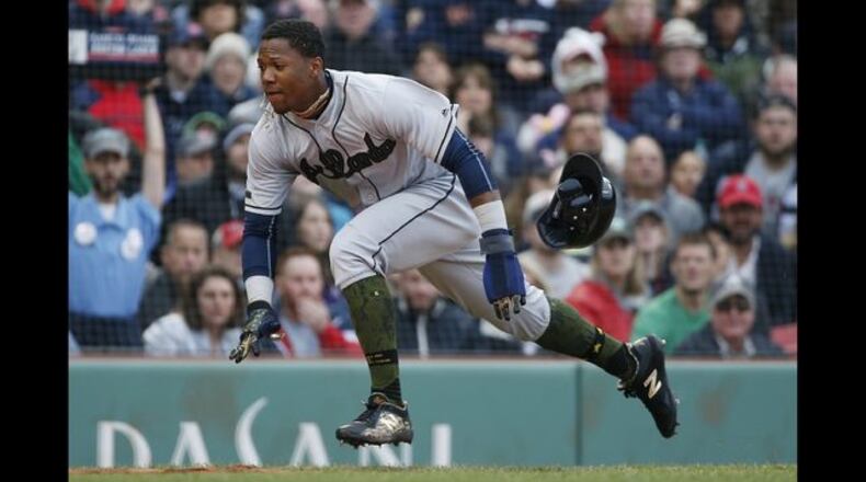 <p> Team personnel help Atlanta Braves' Ronald Acuna Jr. after he was injured while running out a single during the seventh inning of an interleague baseball game against the Boston Red Sox, Sunday, May 27, 2018, in Boston. (AP Photo/Michael Dwyer) </p> <p> Atlanta Braves' Ronald Acuna Jr. begins to slide as he scores on a two-run double by Freddie Freeman during the fifth inning of an interleague baseball game against the Boston Red Sox, Sunday, May 27, 2018, in Boston. (AP Photo/Michael Dwyer) </p> <p> Atlanta Braves' Ronald Acuna Jr., left, scores on a two-run double by Freddie Freeman as Boston Red Sox's Sandy Leon gets the throw during the fifth inning of an interleague baseball game, Sunday, May 27, 2018, in Boston. (AP Photo/Michael Dwyer) </p>