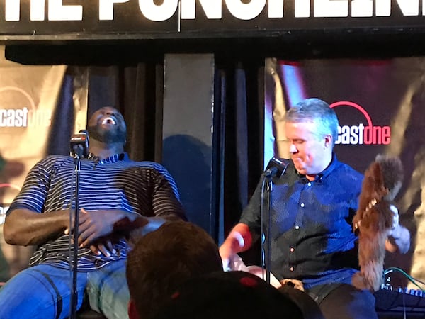 In this case, John Kincade got Shaq to laugh while singing the Peter Gabriel song "Shock the Monkey" with a stuffed monkey (okay, more like a Chewbacca) and a banana. CREDIT: Rodney Ho/rho@ajc.com