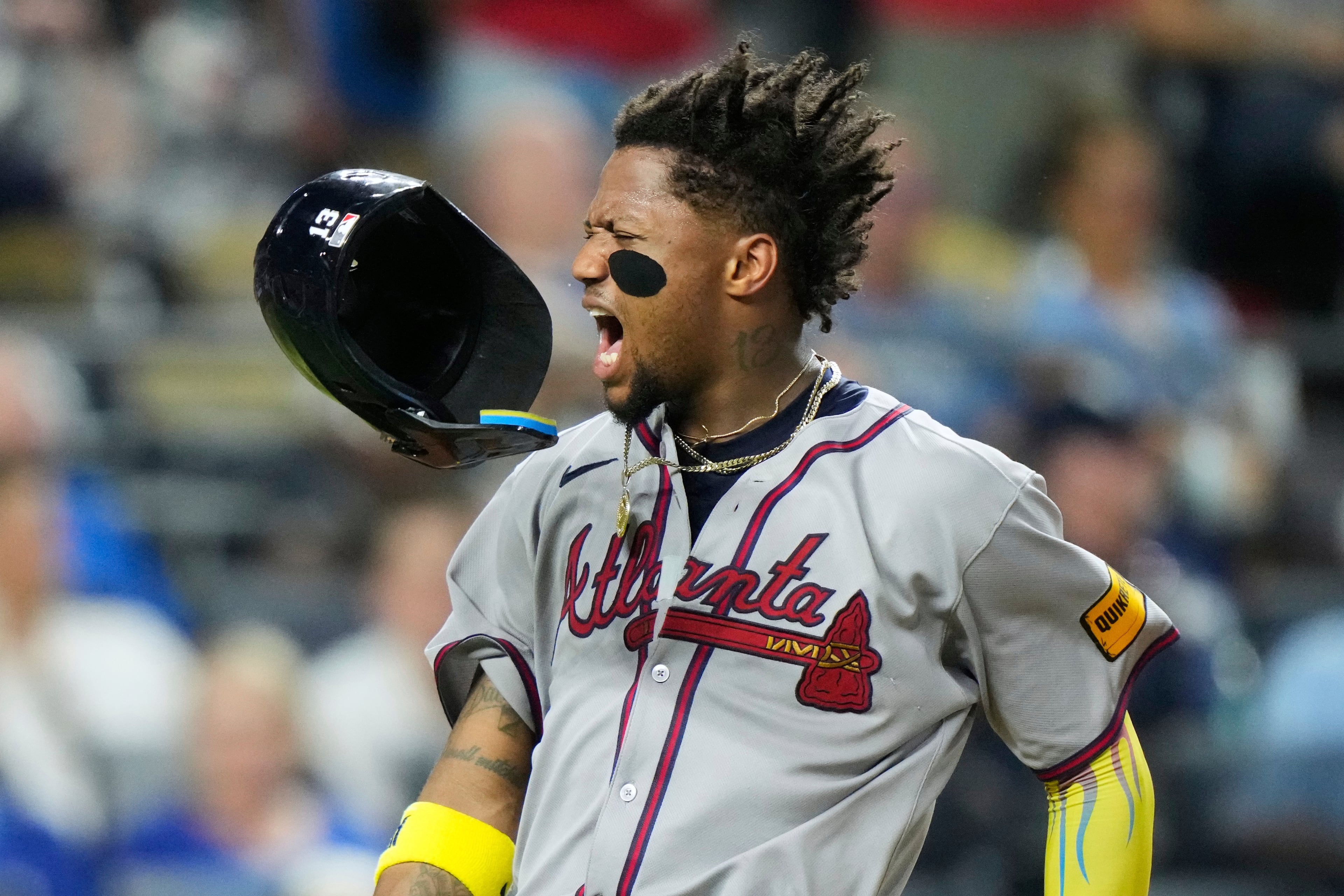 Atlanta Braves' Ronald Acuna Jr. celebrates after scoring on a three-run double hit by Austin Riley during the eighth inning of a baseball game against the Kansas City Royals, Monday, July 28, 2025, in Kansas City, Mo. (AP Photo/Charlie Riedel)