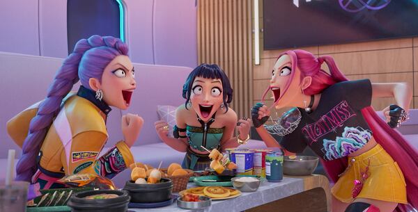 From left, Rumi, Zoey and Mira are the demon-slaying members of the K-Pop band Huntr/x in "KPop Demon Hunters." (Netflix via AP)