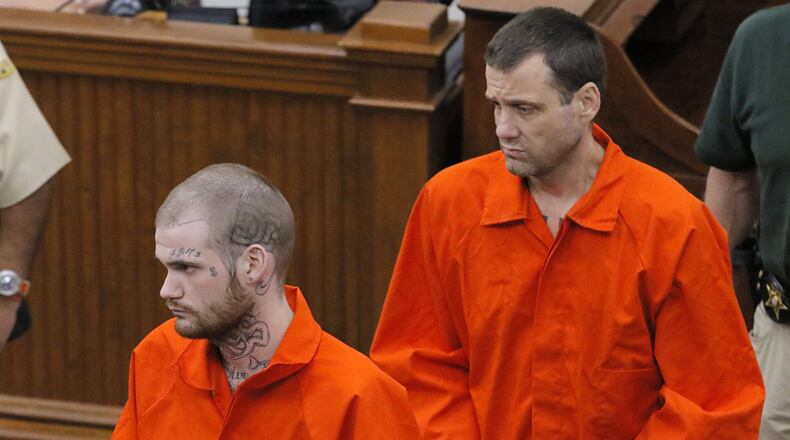 Ricky Dubose (front) and Donnie Russsell Rowe enter the Putnam County Courthouse on June 21, less than a week after they were captured. Dubose and Rowe are accused of killing two prison guards in a brazen escape. District Attorney Stephen Bradley gave official notice Tuesday that he will seek the death penalty for the two inmates. BOB ANDRES /BANDRES@AJC.COM