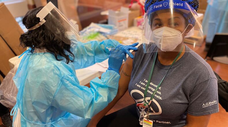 Georgia hospitals are reluctant to require COVID vaccines for