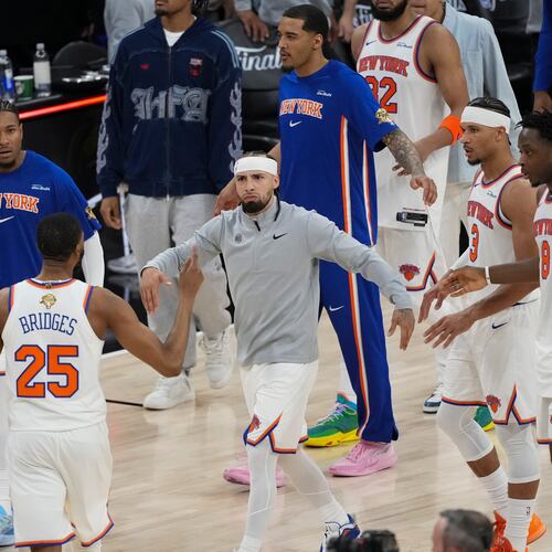 The New York Knicks celebrate after Game 1 of the NBA Finals basketball series against the San Antonio Spurs, Wednesday, June 3, 2026, in San Antonio. (AP Photo/Eric Gay)
