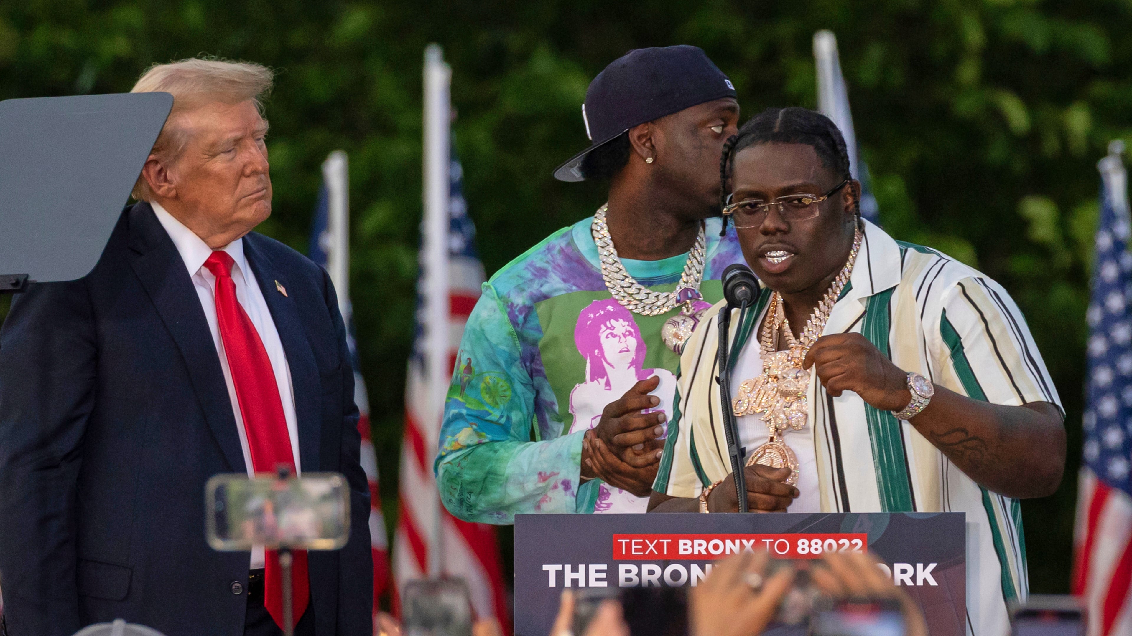 FILE - Rapper Sheff G, also known as Michael Williams, right, joins then Republican presidential candidate Donald Trump during a campaign rally in the Bronx borough of New York on May. 23, 2024. (AP Photo/Yuki Iwamura, File)