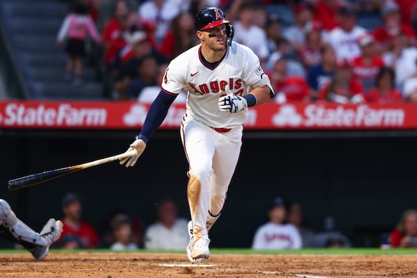 Los Angeles Angels designated hitter Mike Trout drops his bat after hitting a home run during the fifth inning of a baseball game against the Arizona Diamondbacks in Anaheim, Calif., Saturday, July 12, 2025. (AP Photo/Jessie Alcheh)