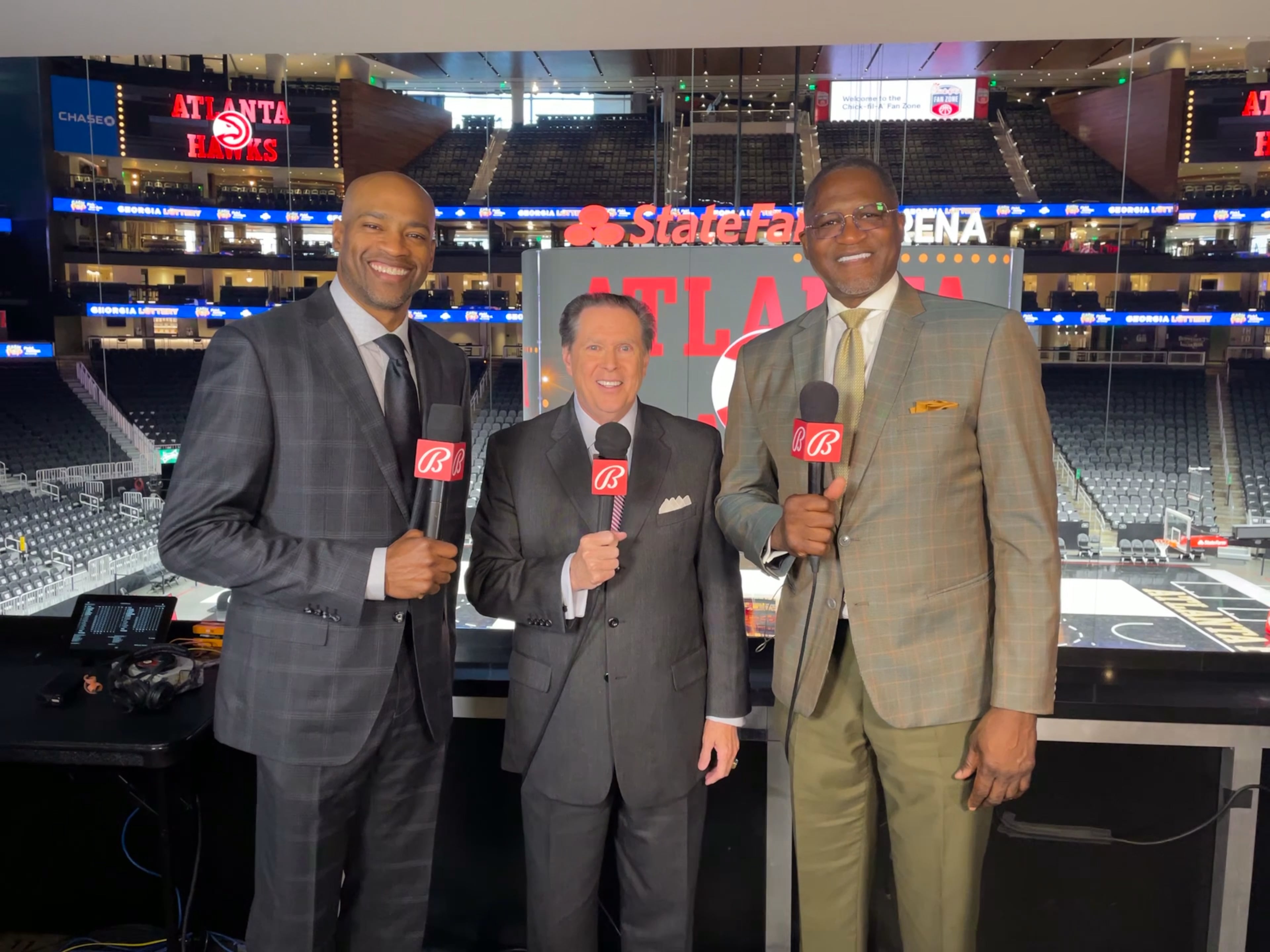 The Hawks broadcasters on FanDuel Sports Network South include play-by-play announcer Bob Rathbun (center) and analyst Dominique Wilkins. At left is former Hawks player Vince Carter, who was an analyst on some broadcasts when the network was known as Bally Sports South. (Courtesy of Bally Sports 2021)