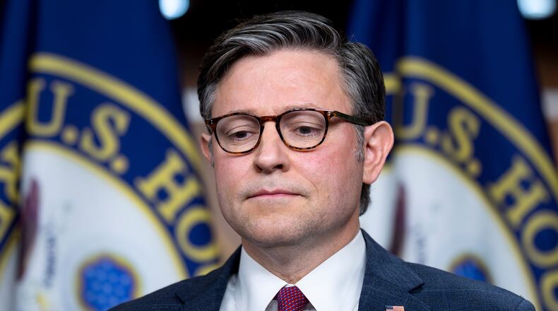 Speaker of the House Mike Johnson, R-La., prepares to speak to reporters following a strategy session with House Republicans, at the Capitol in Washington, Wednesday, Dec. 10, 2025. (AP Photo/J. Scott Applewhite)