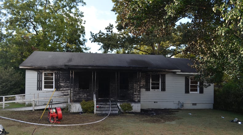 An 83-year-old bedridden woman and her adult son were killed Thursday afternoon when unattended cooking set their Cochran home ablaze, according to officials.