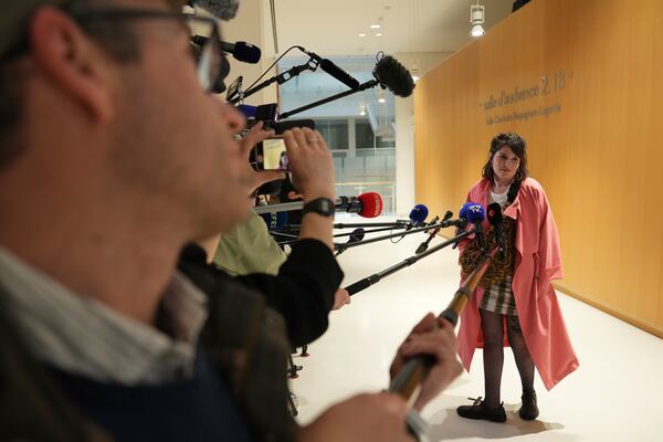 Claude Vincent, a plaintiff's lawyer, answers reporters as part of French actor Gerard Depardieu's trial for the alleged sexual assaults of two women on a film set in 2021, Wednesday, March 26, 2025 in Paris. (AP Photo/Aurelien Morissard)