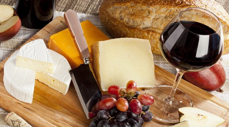 Cheese paired with alcohol, whether beer, whiskey, or wine, is a match made in heaven. (Fotolia)