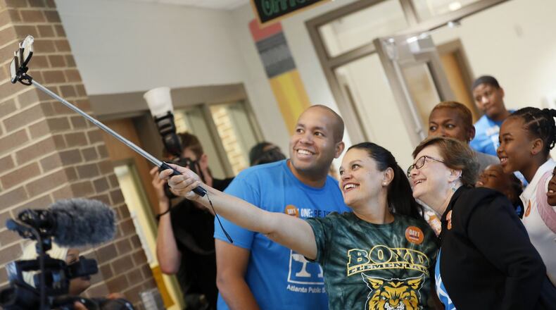 On the first day of the 2018-2019 school year, Atlanta Public Schools Superintendent Meria Carstarphen, center, posted for a selfie with board Chairman Jason Esteves and board member Cynthia Briscoe Brown. A year later, Esteves and Briscoe Brown were among the board members who decided not to extend Carstarphen’s contract. BOB ANDRES /BANDRES@AJC.COM