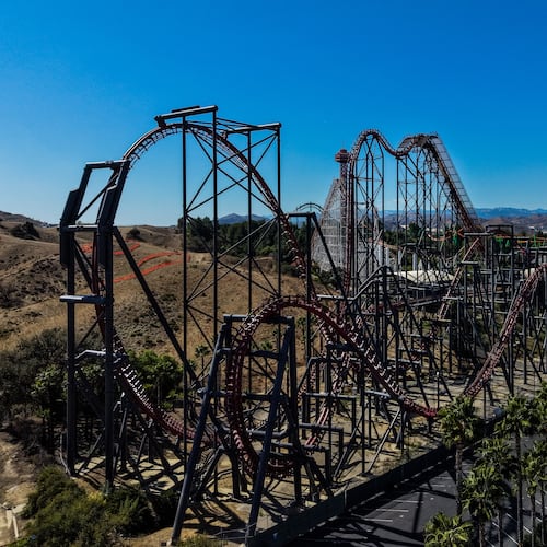 This aerial view shows the X2 roller coaster at Six Flags Magic Mountain in Valencia, Calif., Wednesday, Sept. 23, 2026. (AP Photo/Jae C. Hong)