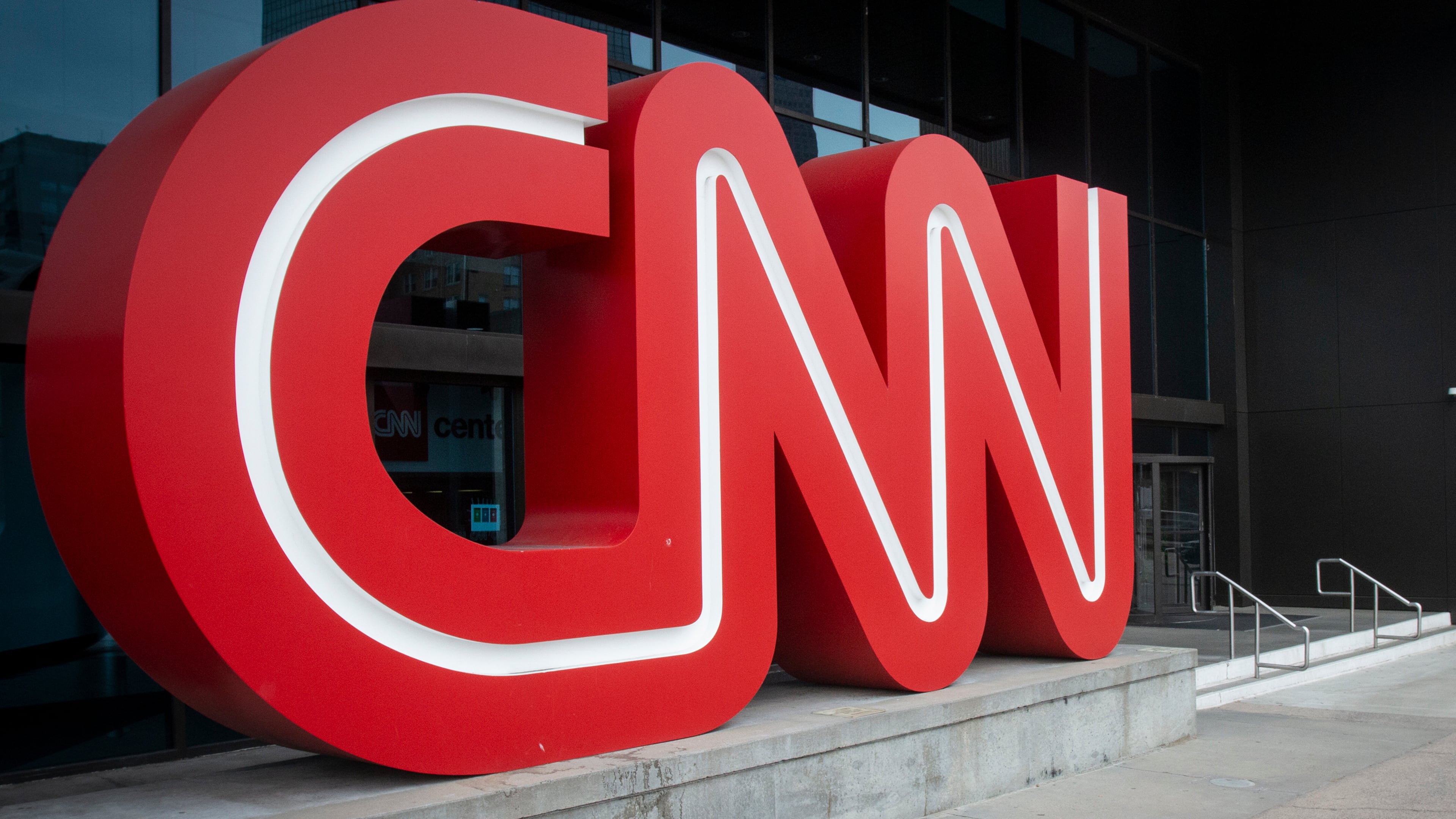FILE - The CNN logo is displayed at the entrance to the CNN Center in Atlanta on Feb. 2, 2022. (AP Photo/Ron Harris, File)