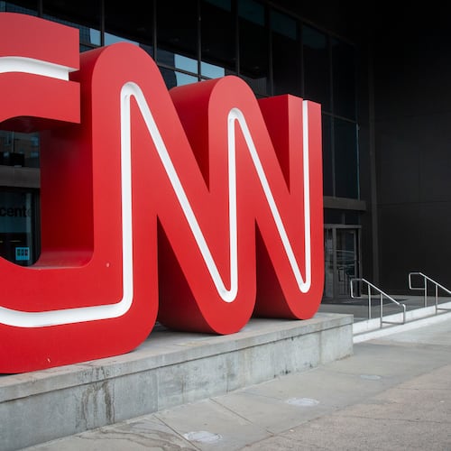 FILE - The CNN logo is displayed at the entrance to the CNN Center in Atlanta on Feb. 2, 2022. (AP Photo/Ron Harris, File)