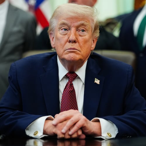 President Donald Trump listens in the Oval Office of the White House, Saturday, April 18, 2026, in Washington. (AP Photo/Julia Demaree Nikhinson)