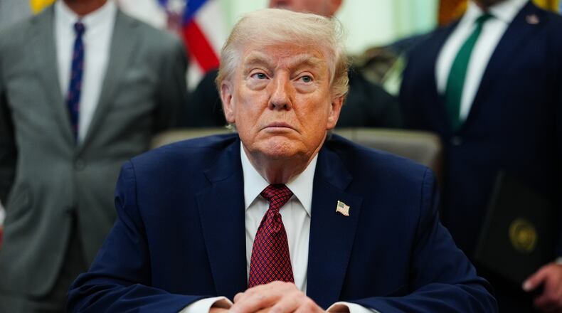 President Donald Trump listens in the Oval Office of the White House, Saturday, April 18, 2026, in Washington. (AP Photo/Julia Demaree Nikhinson)