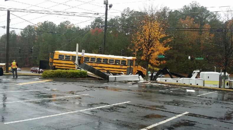 Gwinnett County Public Schools spokeswoman Sloan Roach said the bus "went off the road" at the intersection of Peachtree Industrial Boulevard and North Berkeley Lake Road.