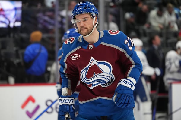 FILE - Colorado Avalanche left wing Jonathan Drouin in the second period of an NHL hockey game, March 8, 2025, in Denver. (AP Photo/David Zalubowski, file)