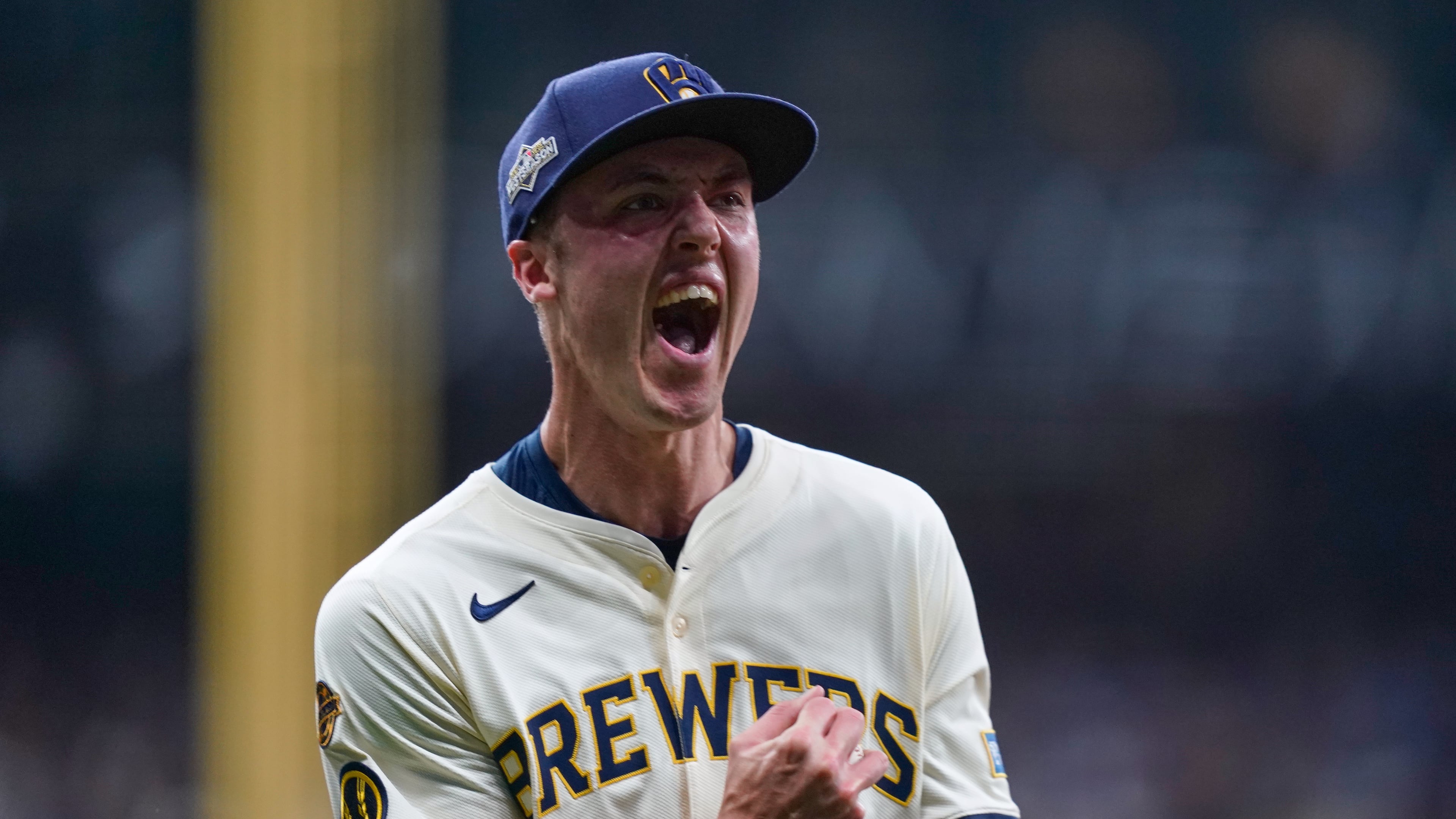 Milwaukee Brewers relief pitcher Jacob Misiorowski (32) celebrates after forcing the final out during the top of the third inning of Game 2 of baseball's National League Division Series against the Chicago Cubs Monday, Oct. 6, 2025, in Milwaukee. (AP Photo/Kayla Wolf)