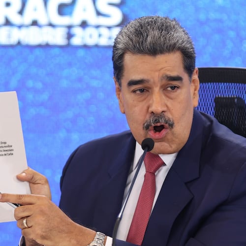 FILE - Venezuela's President Nicolas Maduro points at a map of the Americas during a new conference in Caracas, Venezuela, Sept 15, 2025. (AP Photo/Jesus Vargas), File