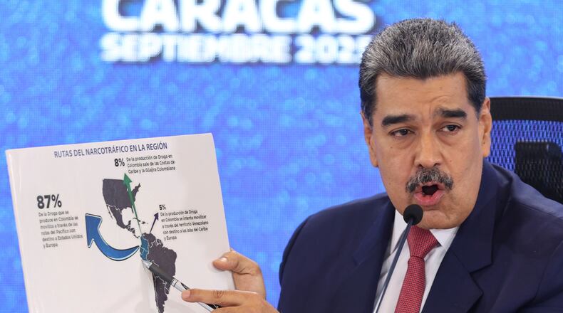 FILE - Venezuela's President Nicolas Maduro points at a map of the Americas during a new conference in Caracas, Venezuela, Sept 15, 2025. (AP Photo/Jesus Vargas), File