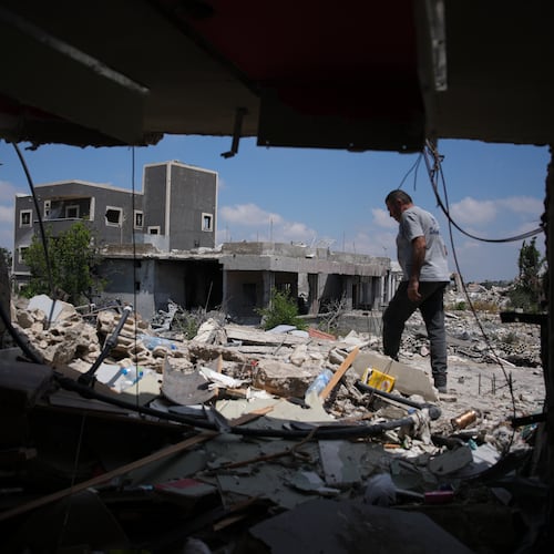 A resident inspects the damage to his home, destroyed in an Israeli airstrike during the Israel-Hezbollah war in Ghandouriyeh village, southern Lebanon, Tuesday, July 21, 2026. (AP Photo/Hassan Ammar)