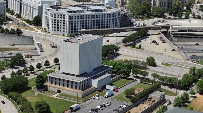 The former Georgia Archive building, located in the shadows of the state Capitol, will be imploded early Sunday to make way for a new Georgia Supreme Court and Court of Appeals building. BRANT SANDERLIN /BSANDERLIN@AJC.COM .