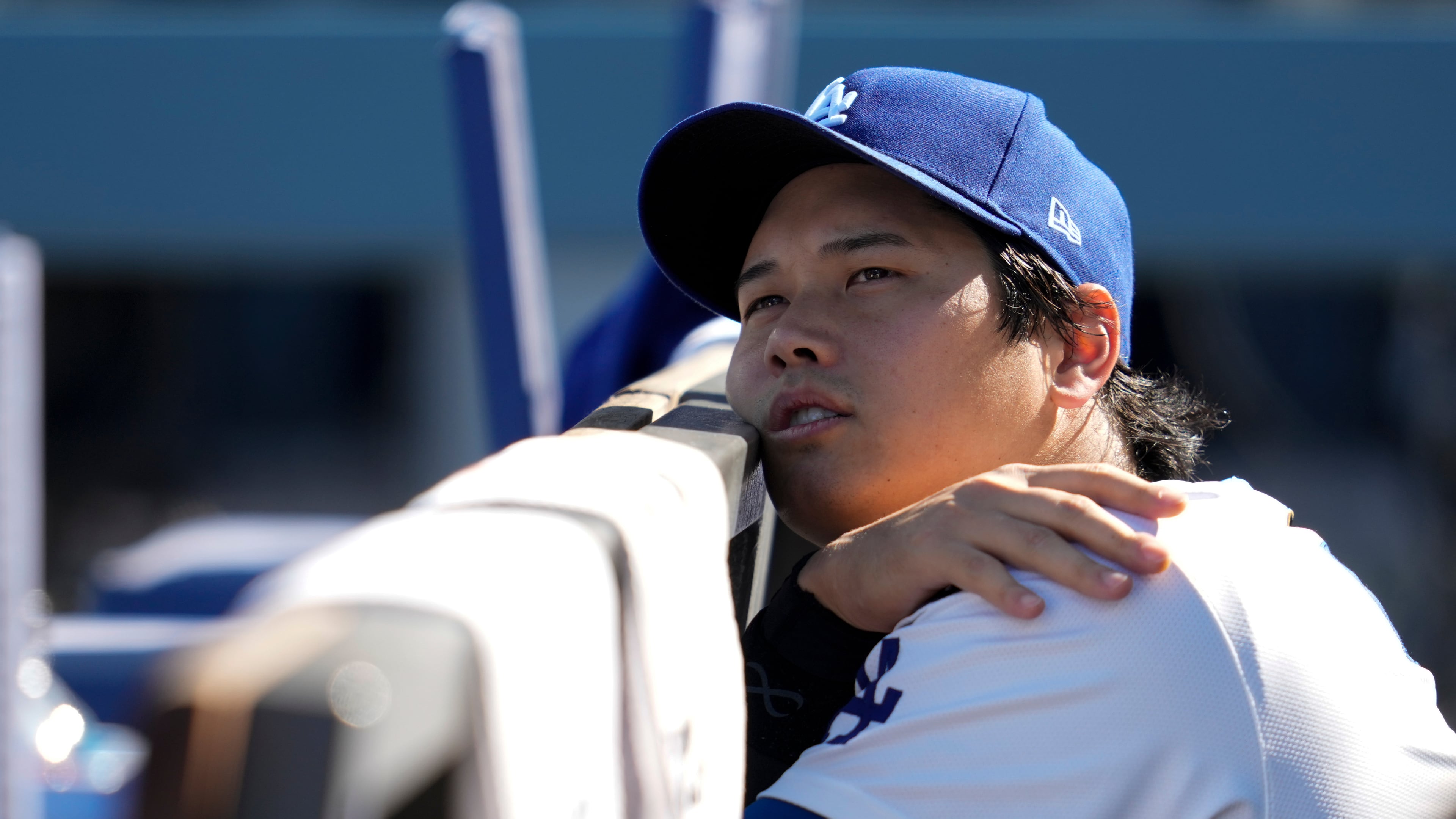 Los Angeles Dodgers' Shohei Ohtani wait for the start of Game 3 of baseball's National League Championship Series between the Milwaukee Brewers and the Los Angeles Dodgers, Thursday, Oct. 16, 2025, in Los Angeles. (AP Photo/Ashley Landis)