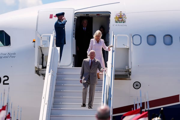 King Charles and Queen Camilla arrive at the Ottawa International Airport in Ottawa, Canada, for a royal visit, on Monday, May 26, 2025. (Justin Tang/The Canadian Press via AP)
