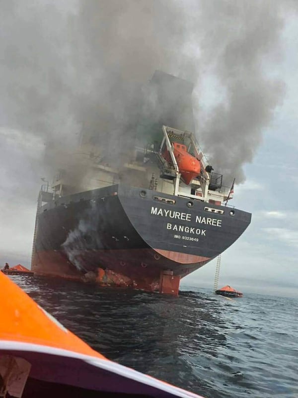 The Thai cargo ship Mayuree Naree was struck and set ablaze in the Strait of Hormuz Wednesday. The strait has been effectively closed since the United States and Israel began bombing Iran. (Royal Thai Navy via AP)