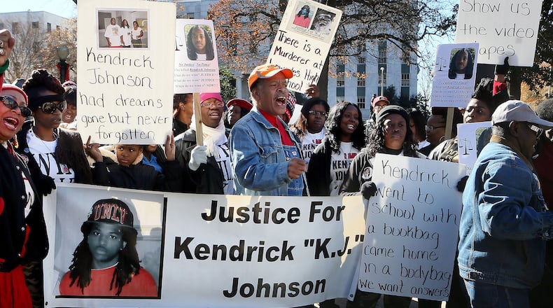 Protesters chant during a "Who Killed K.J." rally for Kendrick Johnson in front of the Georgia State Capitol in Atlanta in December.