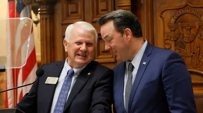 House Speaker Jon Burns, R-Newington, and Lt. Gov. Burt Jones confer before the annual State of the Judiciary Address to a joint session of the House and Senate on Tuesday, January 28, 2025. (Miguel Martinez / AJC)
