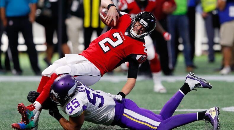 Falcons quarterback Matt Ryan was frequently under pressure in Sunday’s 14-9 loss to Minnesota. On this play he’s tackled by the Vikings’ Anthony Barr after a scramble.