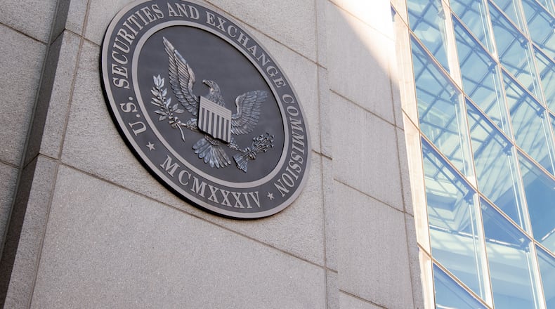 The headquarters of the U.S. Securities and Exchange Commission (SEC) is seen in Washington, D.C. The SEC's actions against a Marietta man's $120 million Ponzi scheme is the basis for a lawsuit filed this month against Oppenheimer & Co., which plaintiffs say hid its involvement with the man's fraud. (Saul Loeb/Getty Images/TNS)