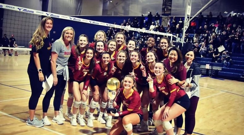 Holy Innocents Volleyball team celebrates after winning a Georgia State Championship. They played 30-plus matches in 2020, with all teams following the COVID protocol.
